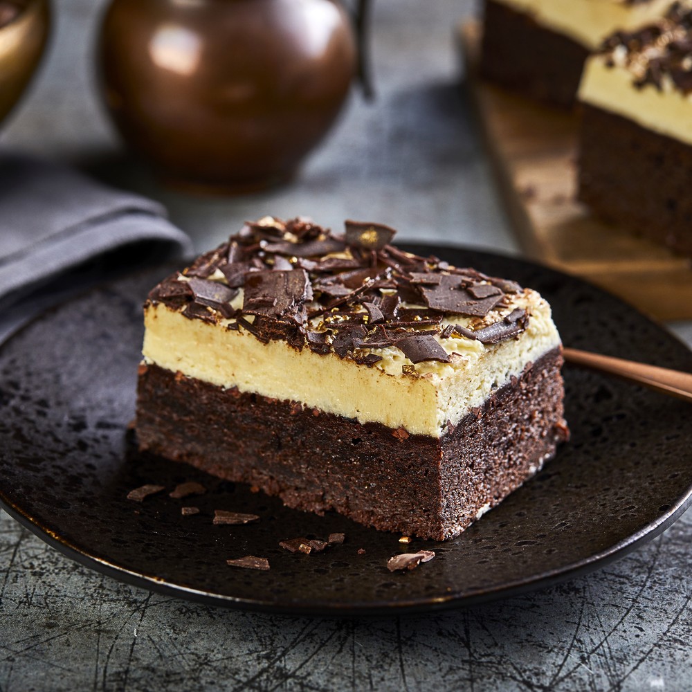 Chantilly slice detail with chocolate flake and gold sugar